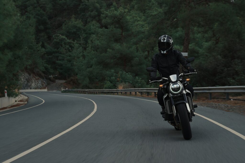 a biker in a helmet on a bike