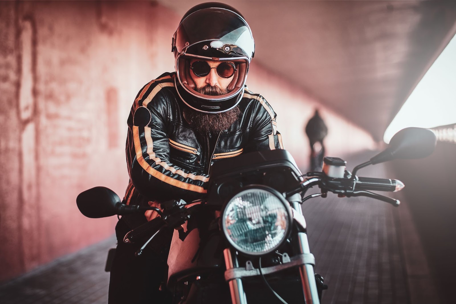 a biker in a helmet on a bike