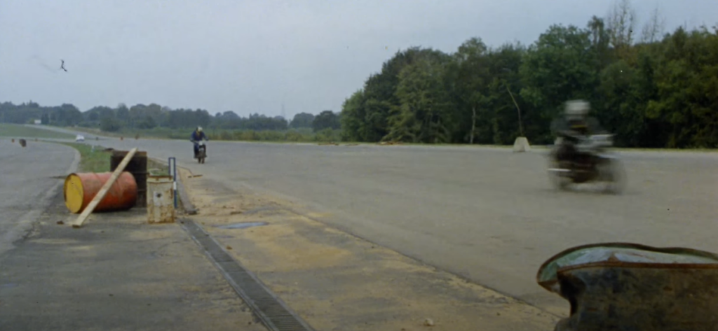 Motorcycles on a broad road